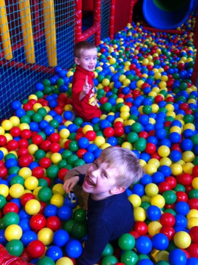 Ian, playing with his friend Adam Kingham. 