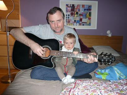 Teaching Dad how to play the guitar