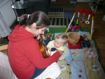 Teaching Mum how to play the mandolin